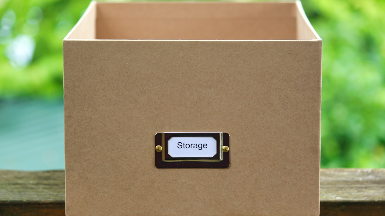 A plain storage box on a shelf