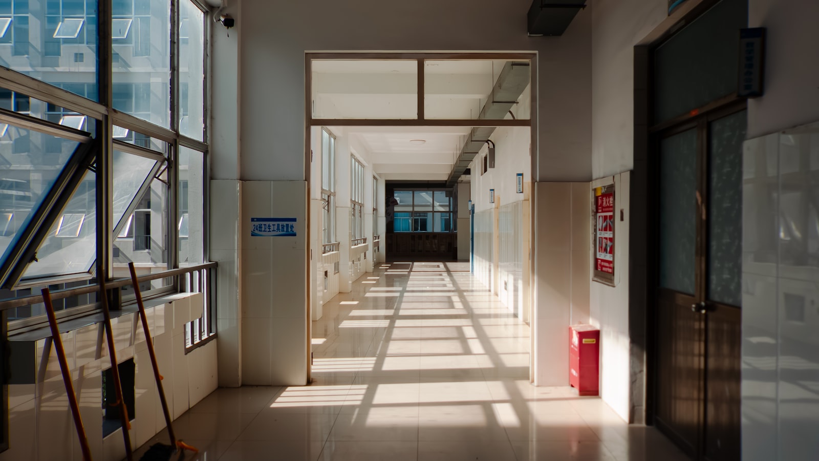A quiet hospital corridor lit by natural light