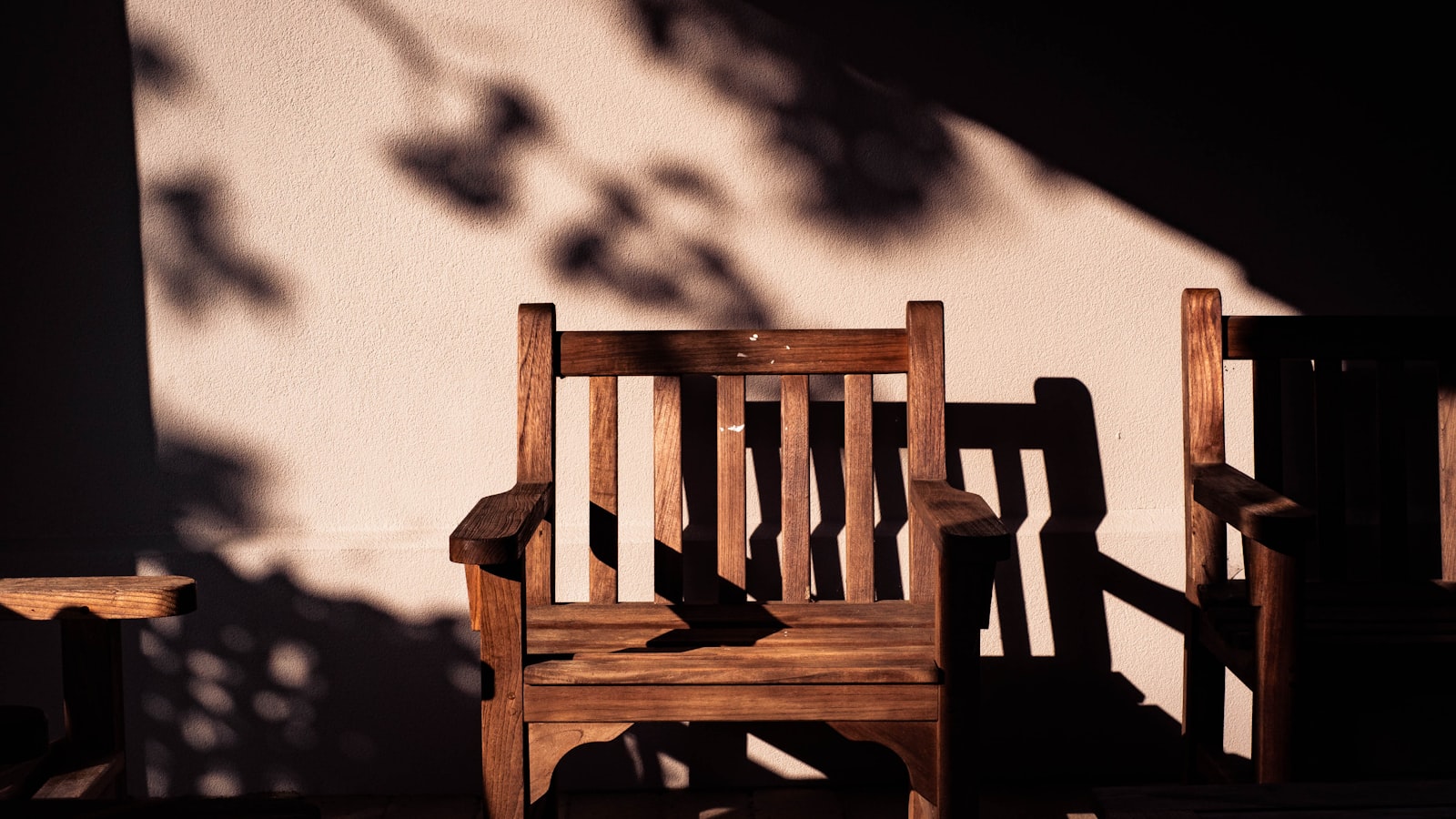 An empty chair by a window, representing an absent or uncooperative spouse in a Singapore divorce