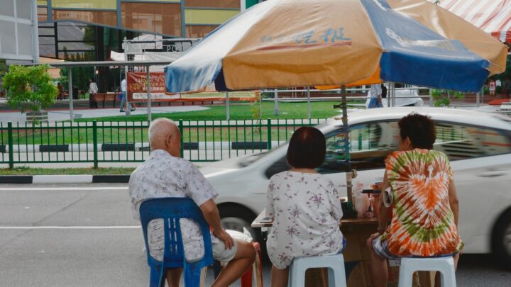 Two people having a supportive conversation over coffee