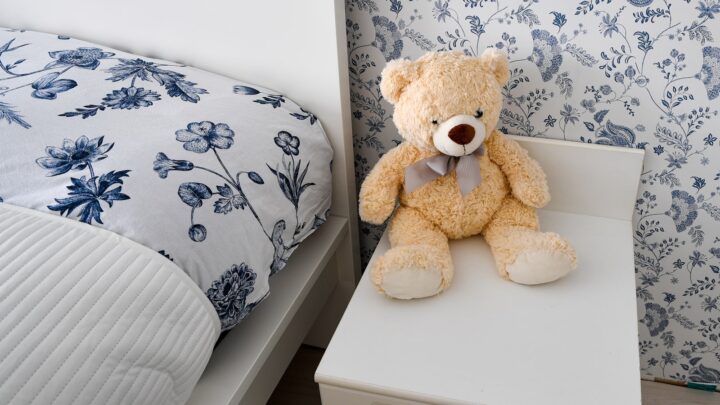 A tidy child's bedroom lit by daylight