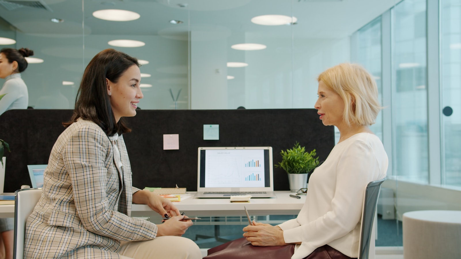 A person receiving help with application paperwork