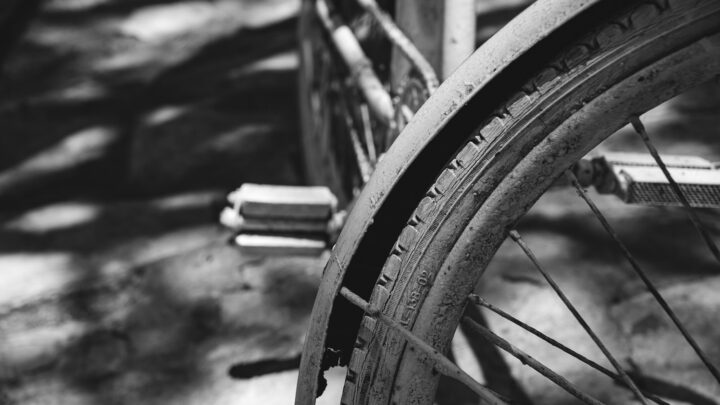 Close-up of a wheelchair wheel outdoors