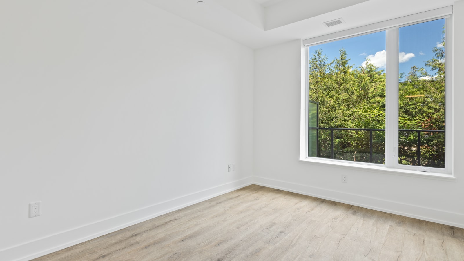 A quiet child's bedroom with light coming through the window