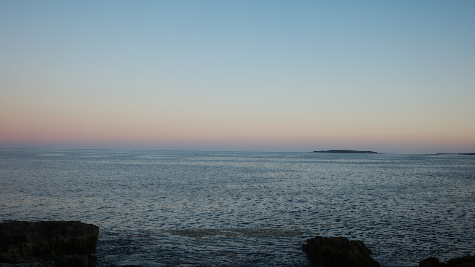 An empty sea horizon at dusk