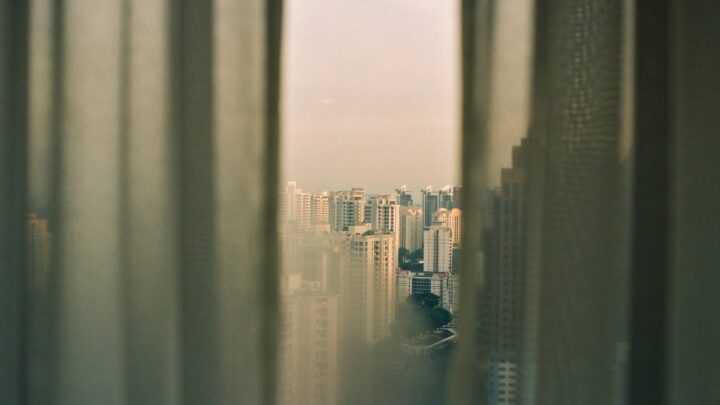 View from an apartment window in Singapore at dusk