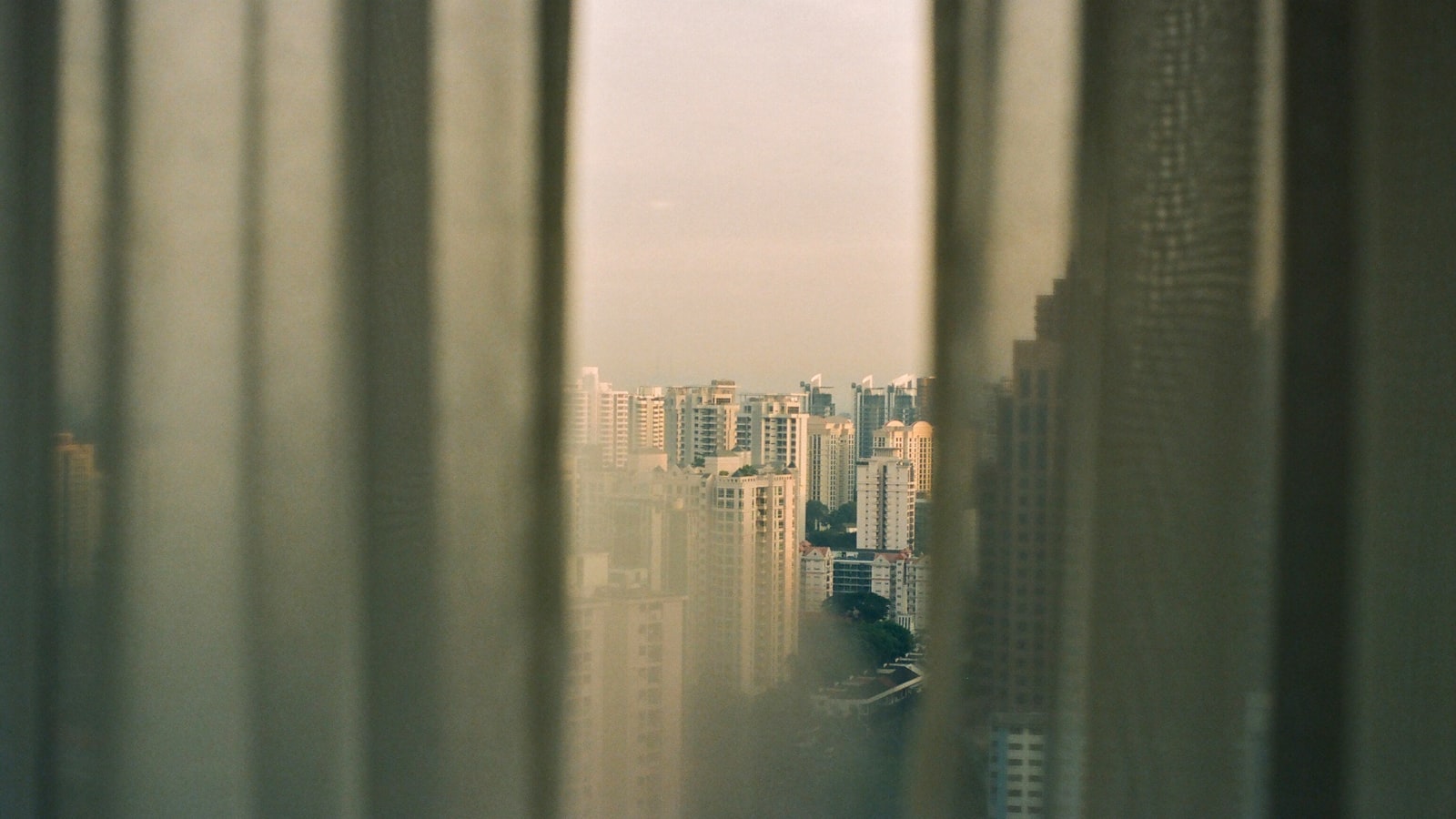 View from an apartment window in Singapore at dusk