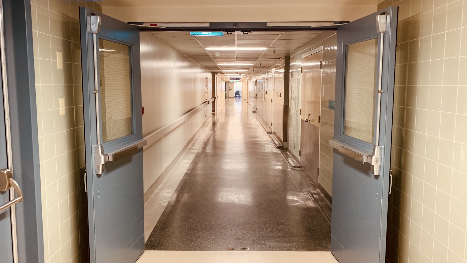 A quiet, brightly lit hospital corridor